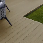 Wood-look composite decking and grass.