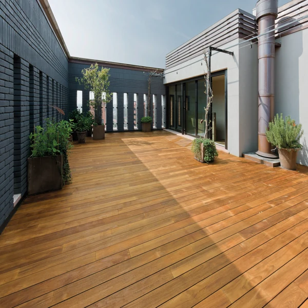 reddish-brown hardwood decking on a rooftop terrace.
